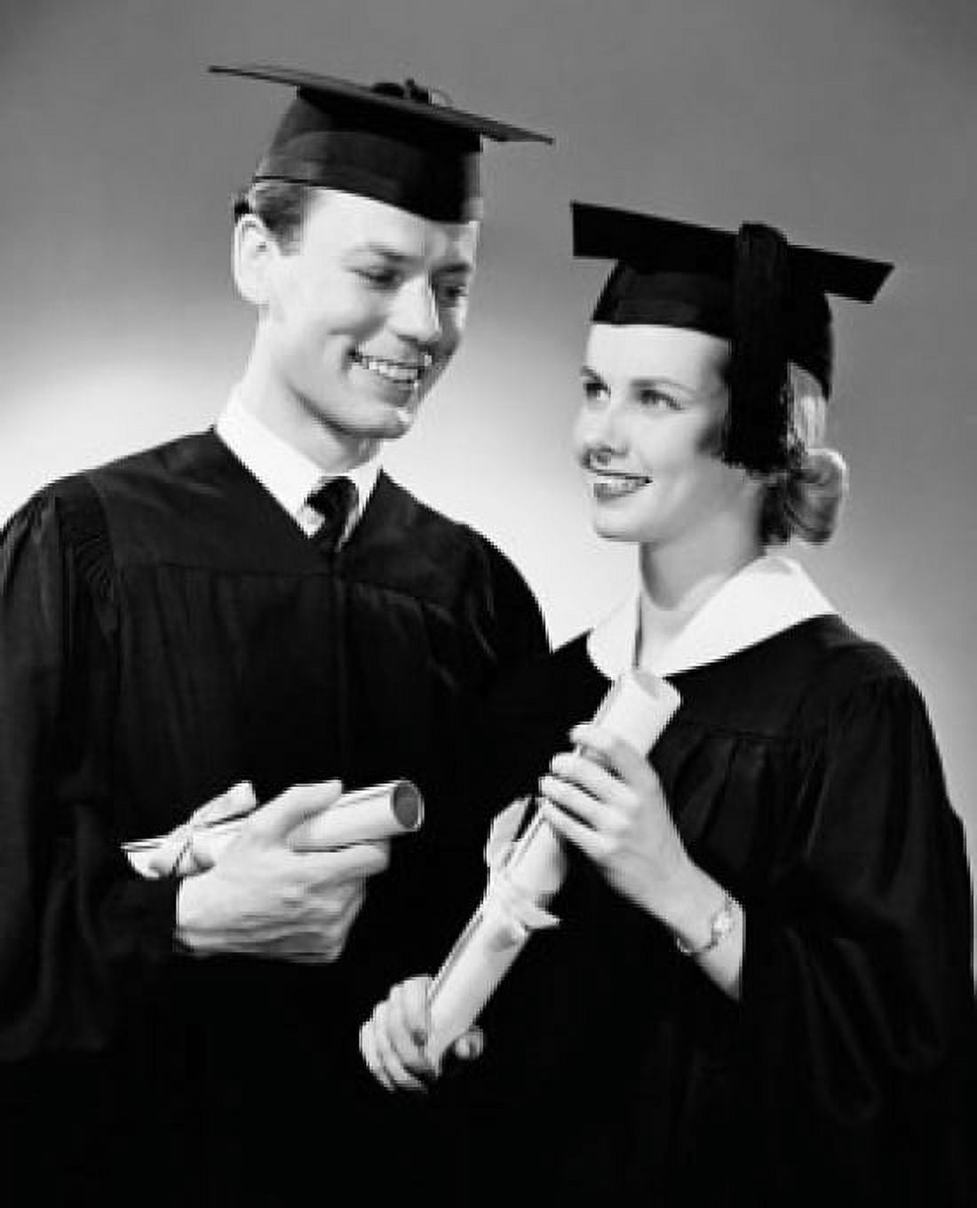 Posterazzi Two graduates holding diplomas and smiling Canvas Art - (24 x 36)