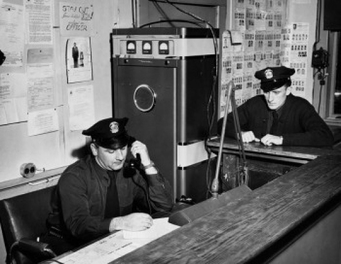 Posterazzi Two policemen working in office Canvas Art - (24 x 36)