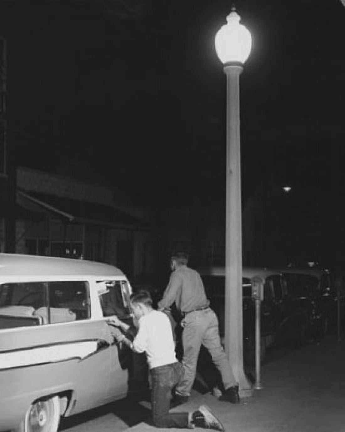 Posterazzi Two young men stealing a car Canvas Art -  (24 x 36)