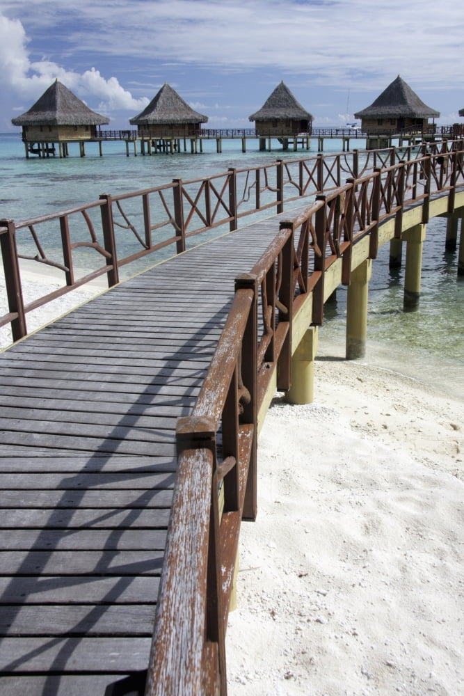Posterazzi Walkway To Holiday Huts Over Lagoon Canvas Art - Michelle Dry Design Pics (24 x 38)