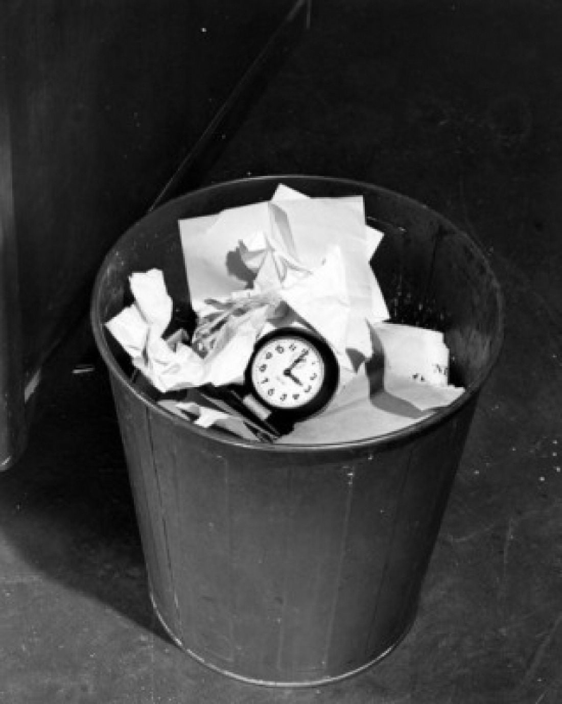Posterazzi Wastebasket with paper and clock inside Canvas Art - (24 x 36)