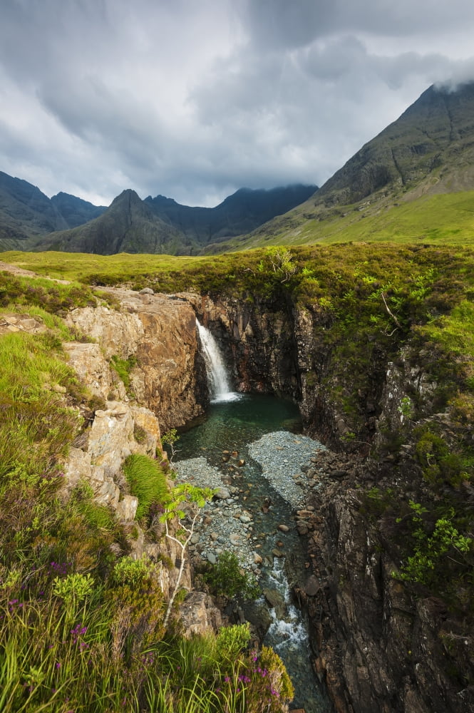 Posterazzi Waterfall in Coire na Creiche (The Fairy Pools) near Glen Brittle with the hills of the Black Cuillin in the background Isle of Skye Scotland Canvas Art - Ian Cumming Design Pics (24 x 38)