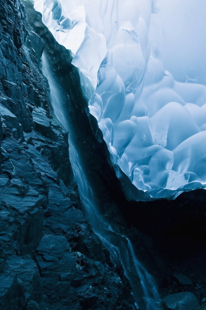 Posterazzi A Waterfall Trickles Its Way Down The Rock Face Of An Ice Cave Inside The Mendenhall Glacier Juneau Southeast Alaska Summer Canvas Art - Chris Miller Design Pics (24 x 38)