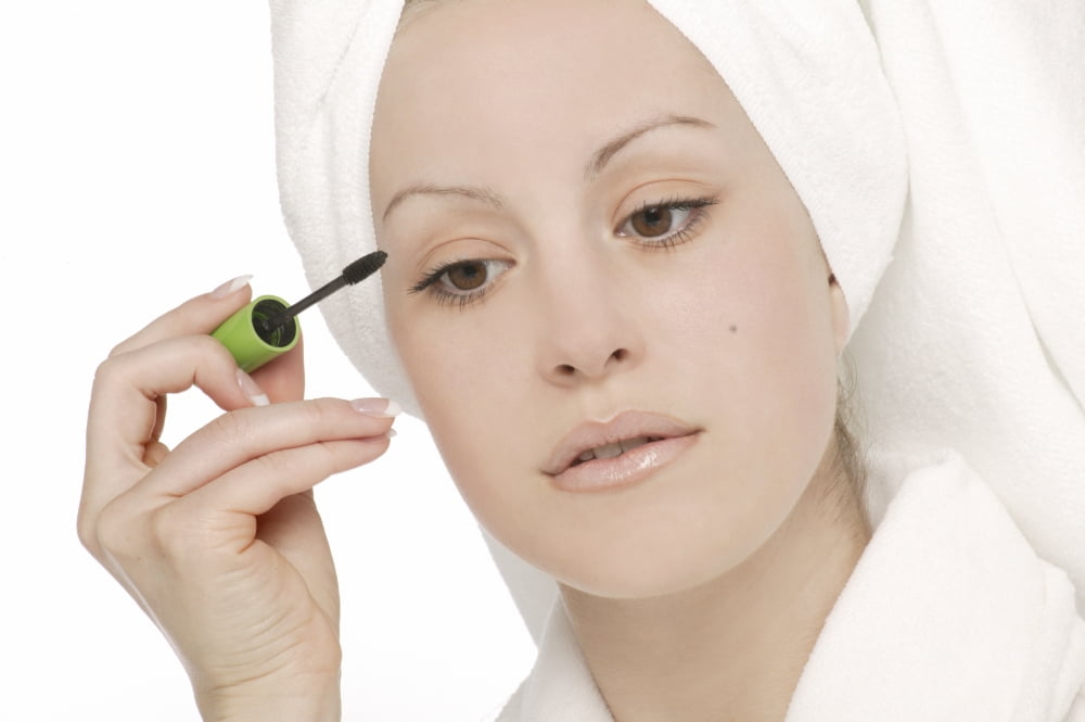 Posterazzi Woman Applying Mascara Canvas Art - Don Hammond Design Pics (34 x 22)