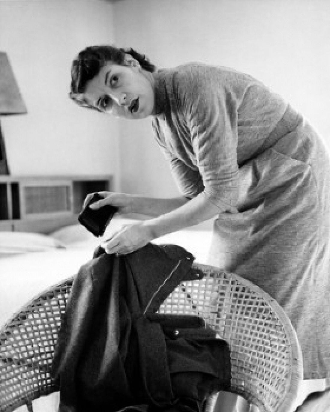 Posterazzi Woman searching for wallet in jacket Canvas Art -  (24 x 36)
