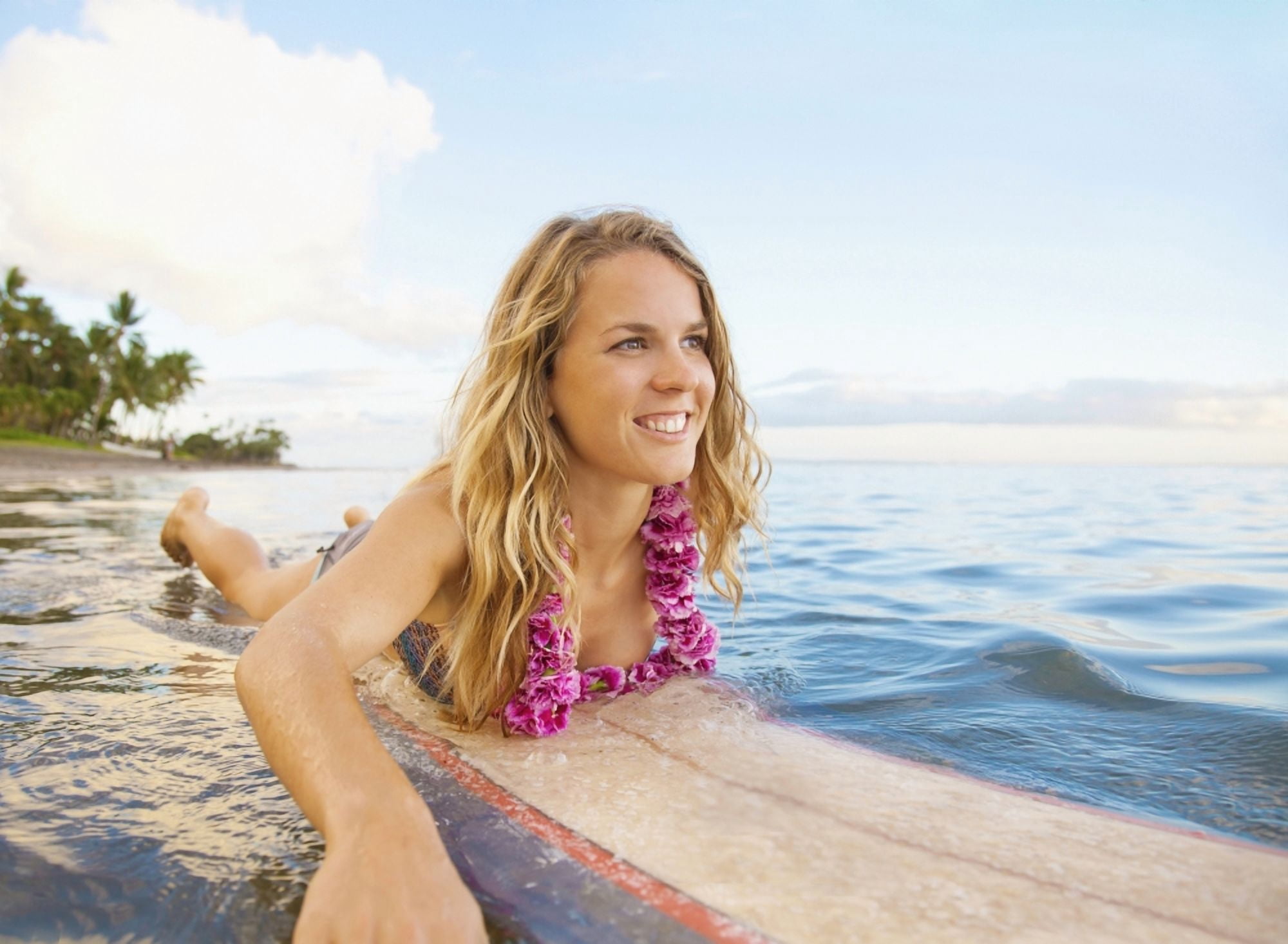 Posterazzi A Young Woman Wearing A Lei Rides A Surfboard Out In The Water Maui Hawaii United States Of America Canvas Art - Brandon Tabiolo Design Pics (36 x 26)