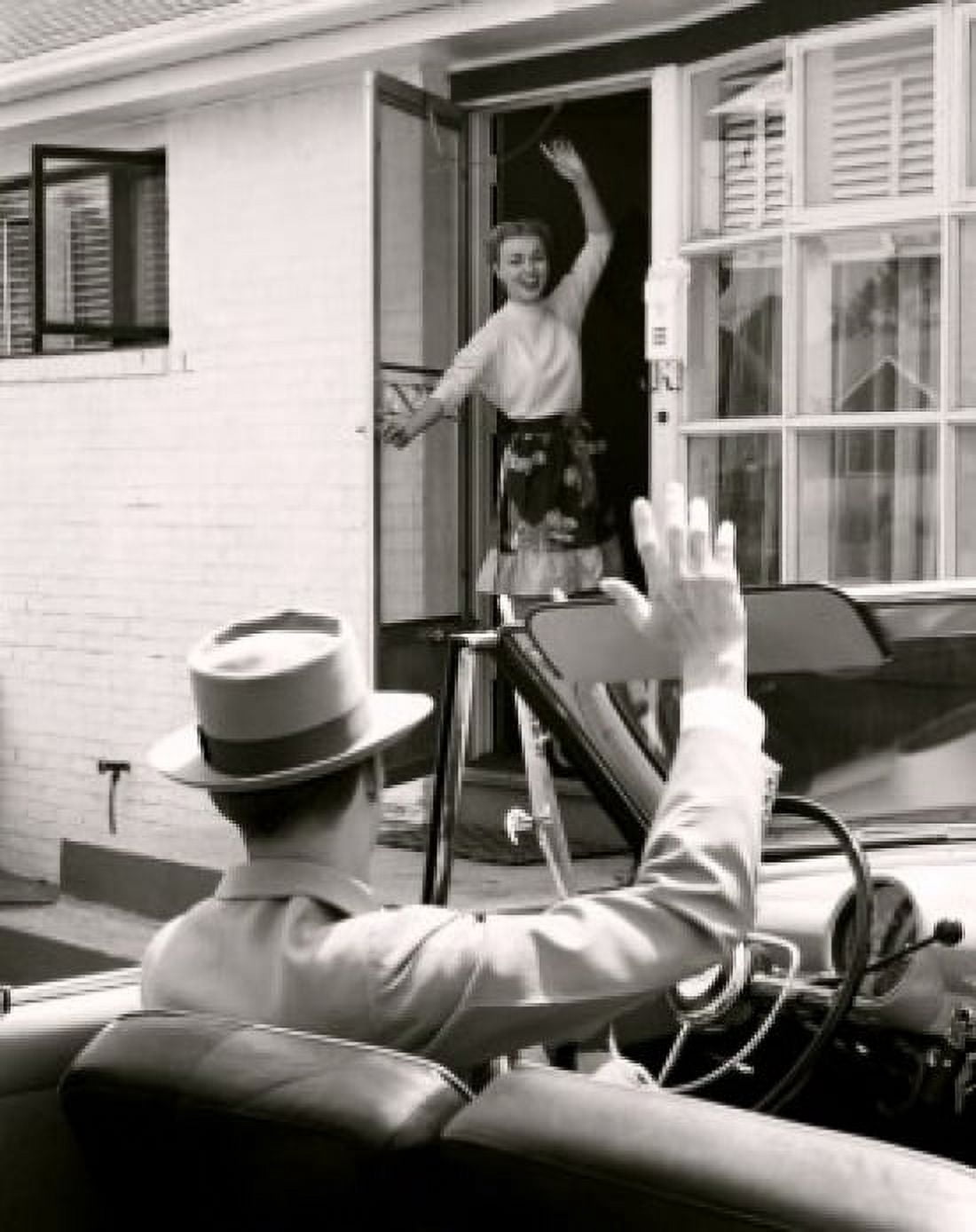 Posterazzi Young couple waving to each other Canvas Art -  (24 x 36)