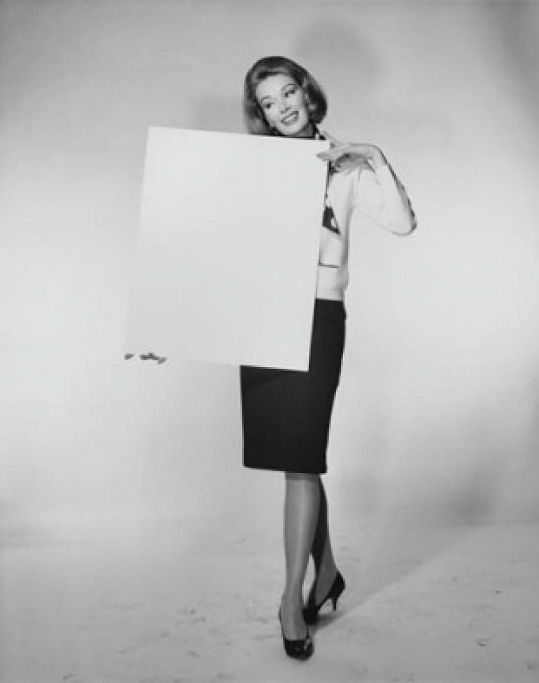 Posterazzi Young woman holding a blank placard Canvas Art -  (24 x 36)