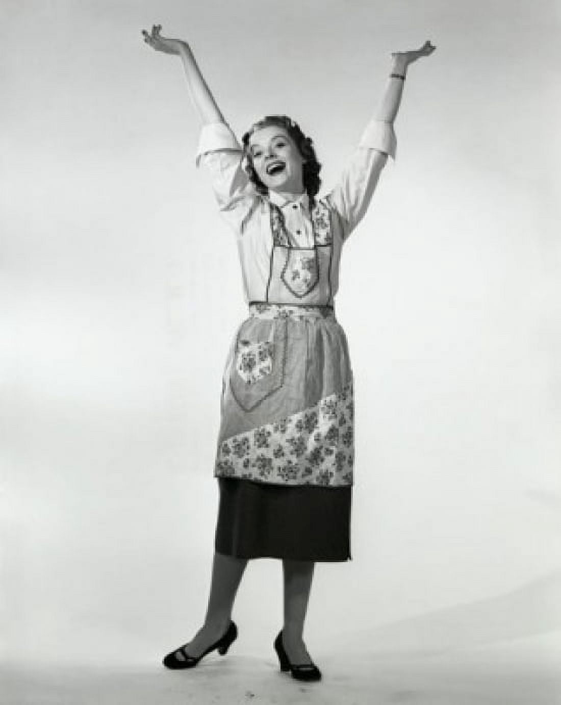 Posterazzi Young woman standing with her arms raised Canvas Art -  (24 x 36)