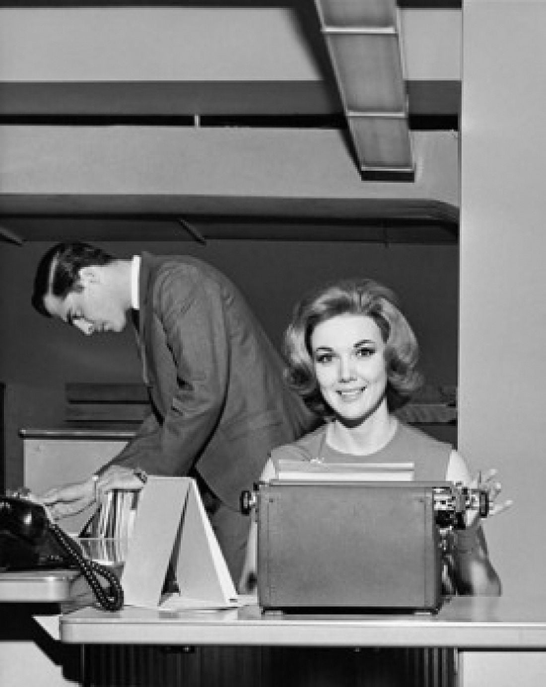 Posterazzi Young woman typing a document on a typewriter in an office Canvas Art - (24 x 36)
