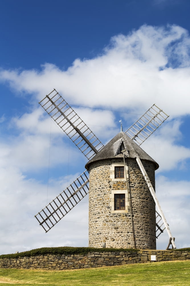 Posterazzi An old stone windmill on a hillside with wooden blades surrounded by a stone fence with blue sky and clouds Brehec Brittany France Canvas Art - Michael Interisano Design Pics (24 x 38)