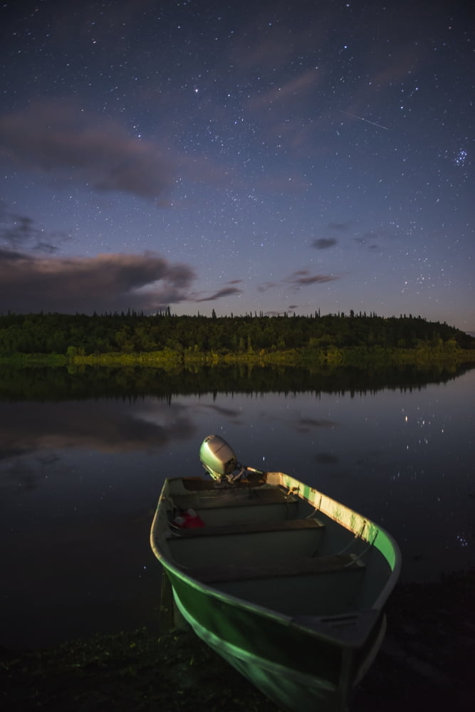 Posterazzi A skiff rests on the banks of the Kvichak River at night Bristol Bay Region Southwest Alaska Canvas Art - Carl Johnson Design Pics (24 x 38)