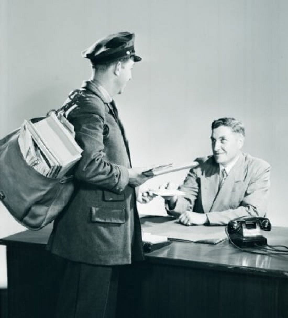 Postman bringing mail to a man sitting behind desk Canvas Art - (18 x 24)