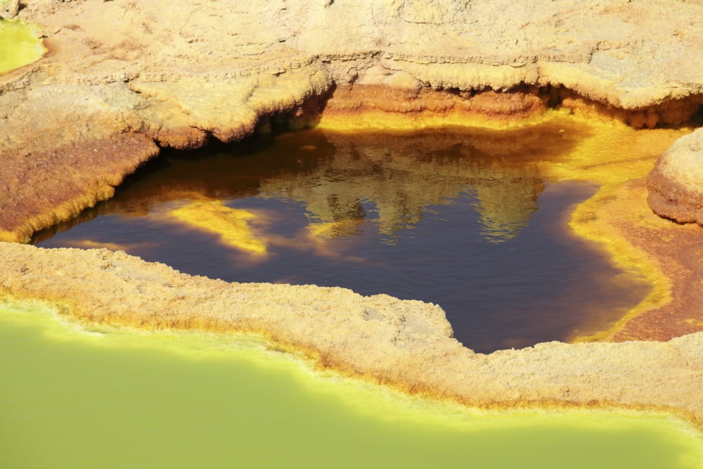 Potassium salt deposits Dallol geothermal area Danakil Depression Ethiopia Canvas Art - Richard RoscoeStocktrek Images (35 x 23)