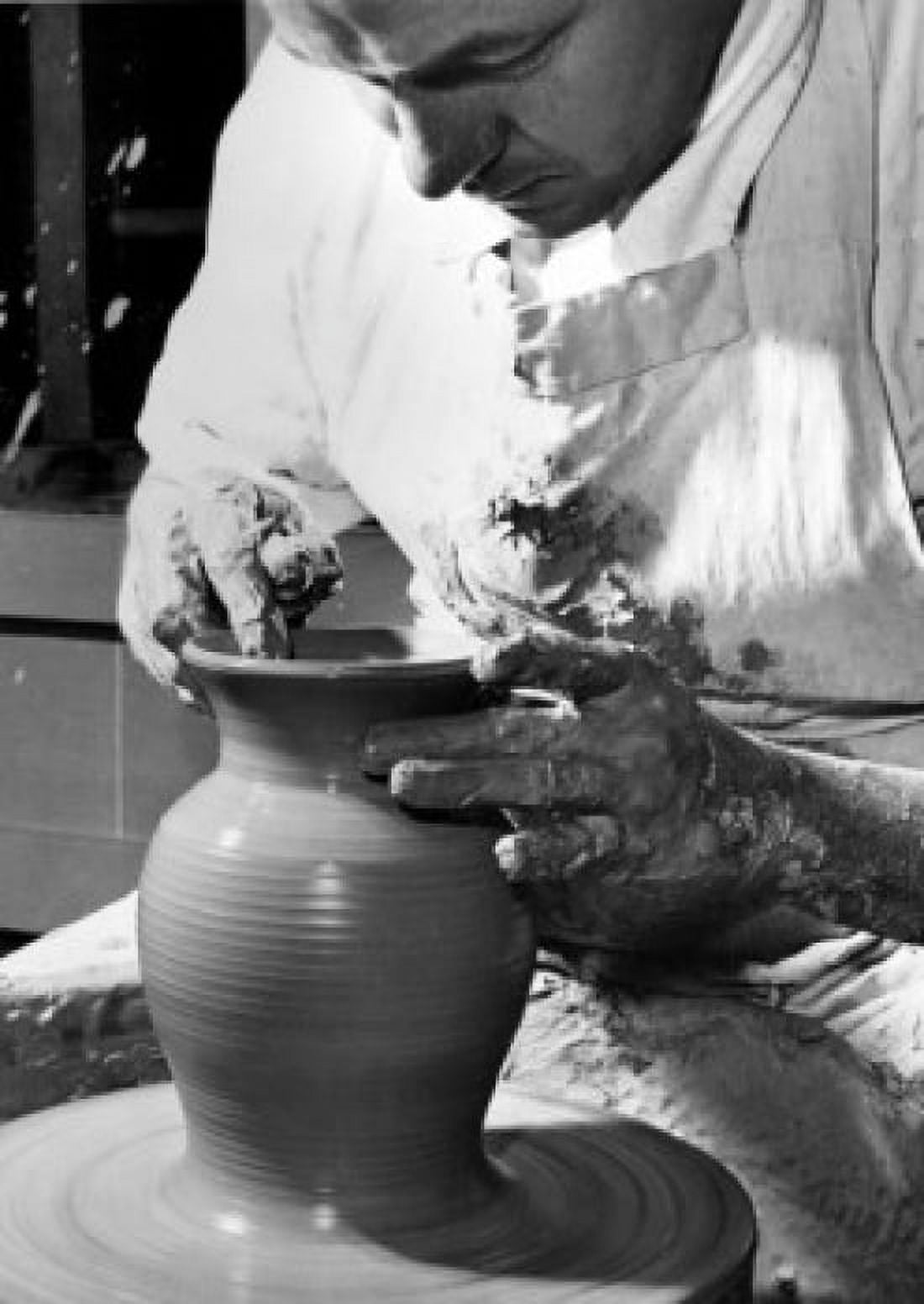 Potter working on a pottery wheel Canvas Art - (24 x 36)