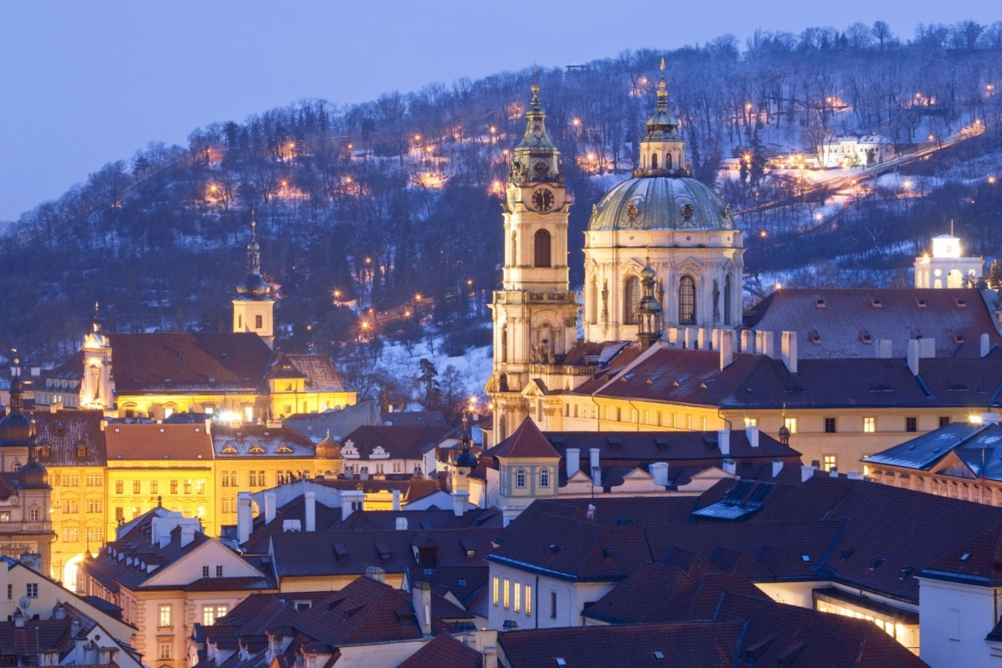 Prague - St Nicolas church and rooftops of Little Quarter in winter Canvas Art - Panoramic Images (36 x 12)