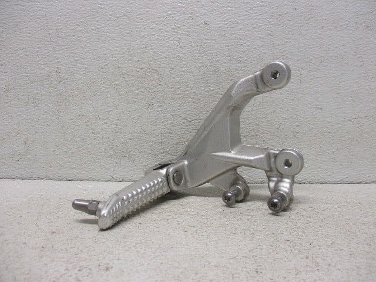 Pre-Owned 16 2016 BMW S1000RR LH Footrest 7728307 OEM LKQ - Verify Specific Vehicle Fitment In Description - (Good)