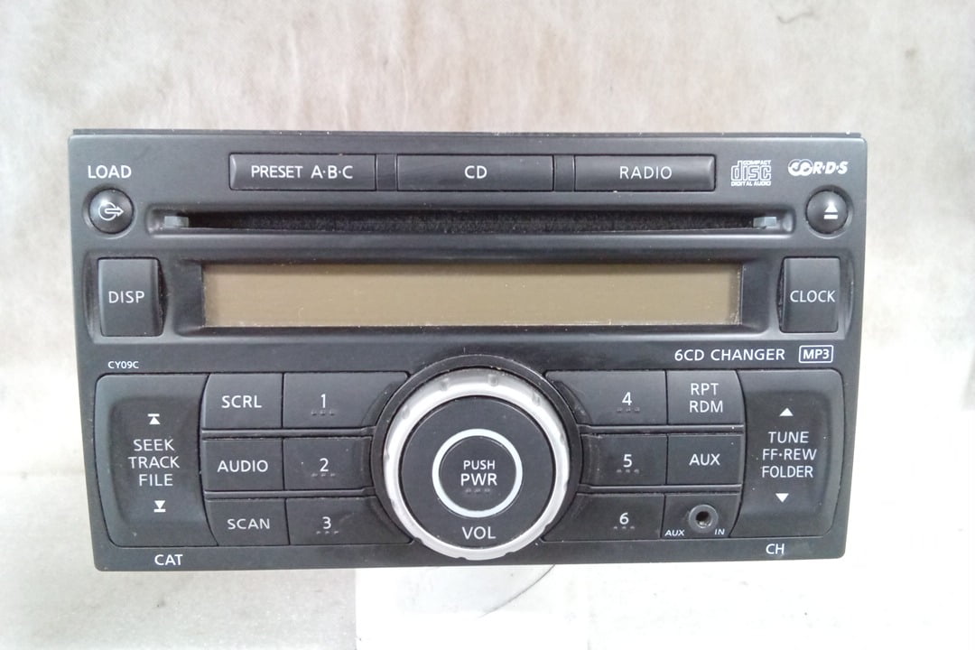 Pre-Owned 2007 Nissan Versa AM FM 6 Disc CD MP3 Receiver CY09C OEM LKQ - Verify Specific Vehicle Fitment In Description - (Good)