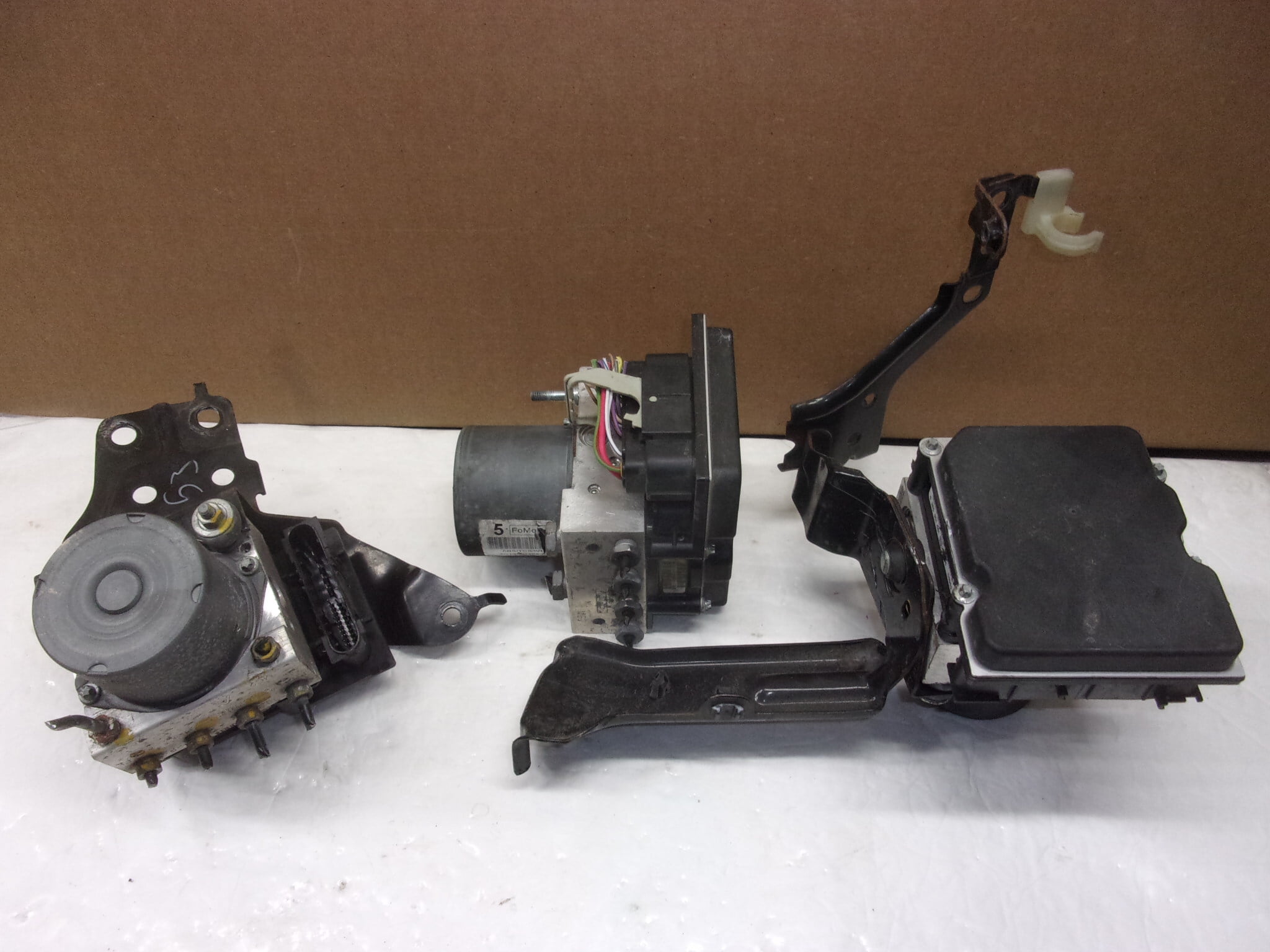 Pre-Owned 2015-2019 Nissan Versa Sdn ABS Anti Lock Brake Control Unit 110K OEM - Verify Specific Vehicle Fitment In Description - (Good)