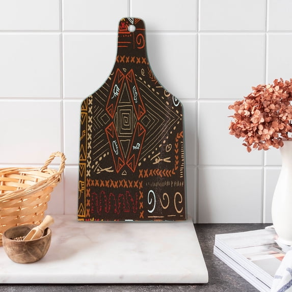 Prehistoric Cutting Board, Aboriginal Style Patterns Tribal Motifs Objects Collage of Cave Pictures, Tempered Glass Cutting and Serving Board, Wine Bottle Shape, Orange and Black, by Ambesonne
