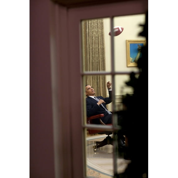 President Barack Obama Plays With A Football In The Oval Office April 23 2009. History (24 x 36)