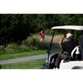 thumbnail image 1 of President Barack Obama Waves To An Onlooker While Playing Golf During His Vacation On Martha'S Vineyard Aug. 24 2009., 1 of 1