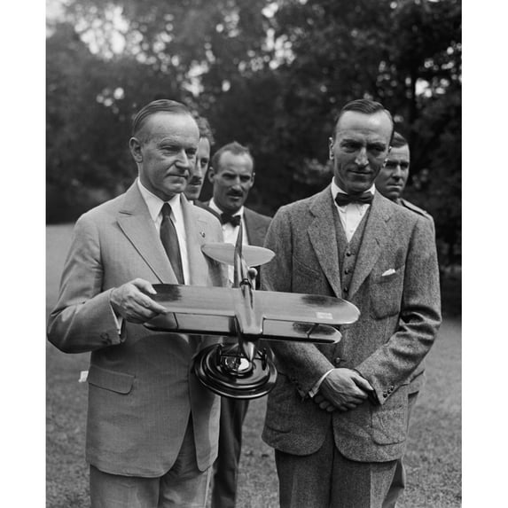 President Calvin Coolidge Examines A Model Airplane History (18 x 24)