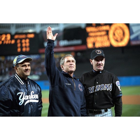 President George W. Bush Waves To The World Series Crowd At Yankee Stadium. With Him Are Yankees Manager Joe Torre