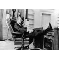 thumbnail image 1 of President Gerald Ford'S First Week In Office. Ford Talks On The Telephone In The Oval Office In The White House. Aug. 18, 1 of 2