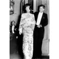 thumbnail image 1 of President And Jaqueline Kennedy In Paris. The First Lady Wears And White And Pink Straw Lace Evening Dress During Their Visit To Paris. They Are Leaving The French Foreign Ministry For A Reception At, 1 of 1