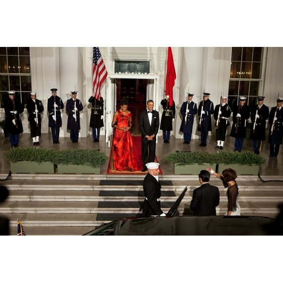 President And Michelle Obama Welcome President Hu Jintao Of China To The White House For The State Dinner Jan. 19 2011. Michelle Wears A Chinese Red Evening Dress Of Red Petal Print Silk Organza By