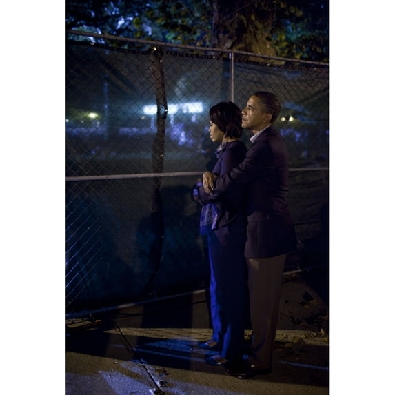 President Obama Embraces Michelle Before They Speak At A Campaign Rally On The Campus Of Ohio State University In