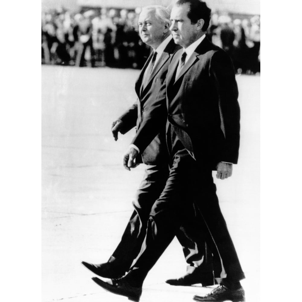 President Richard Nixon And British Prime Minister Harold Wilson Walk In Step. They Were Reviewing An Honor Guard Upon