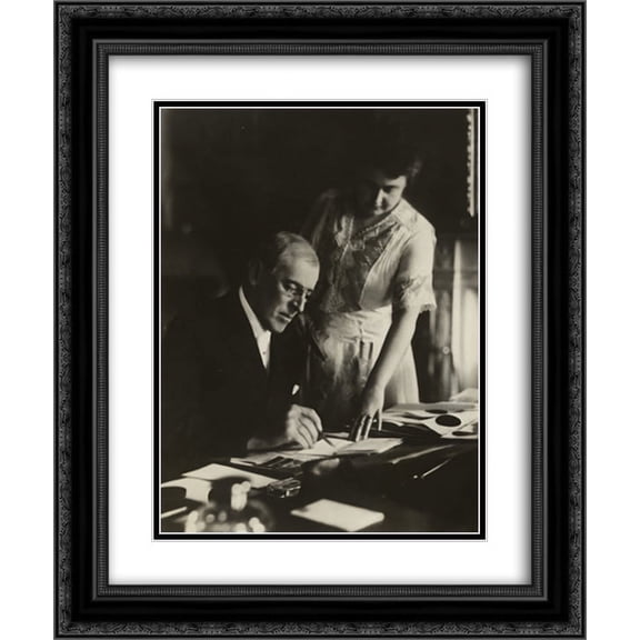 President Woodrow Wilson, seated at desk with his wife, Edith Bolling Galt, standing at his side 16x24 Double Matted Black Ornate Framed Art Print