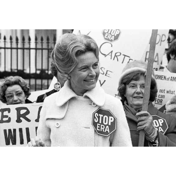Print: Activist Phyllis Schafly Wearing A Stop Era Badge, Demonstrating