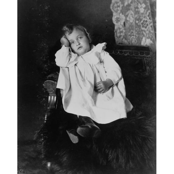 Print: African American Girl, Seated In Chair, Facing Front, 1899