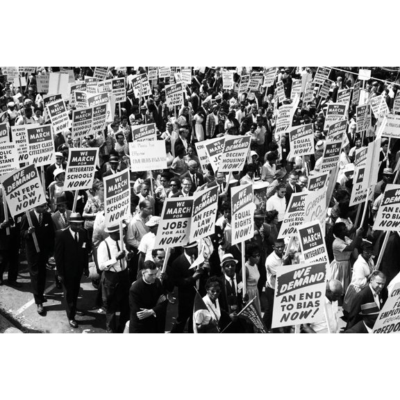 Print: Demonstrators Marching In The Street Holding Signs During The March