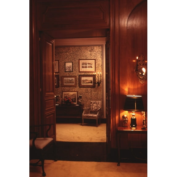 Print: Doorway Into Room With Pictures On Wall At Home Of Ann Bonfoey