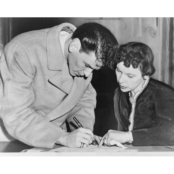 Print: Frank Sinatra Signs His Induction Papers, 1943