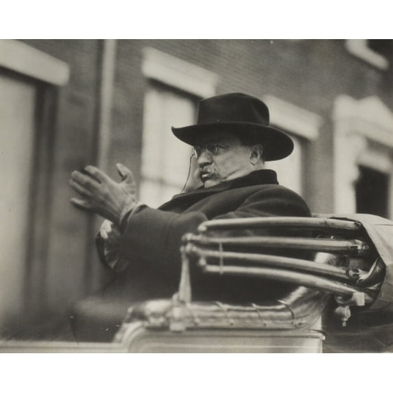 Print: Hon. Theodore Roosevelt Seated In A Carriage, Wearing Hat, 1921