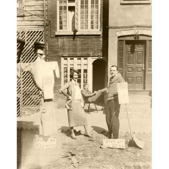 Print: Husband and Wife In Front Of House, Bedford Street, New York, circa