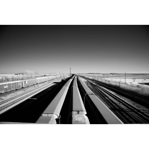 Print: Long Trains Glide Across The Western United States Skyline In