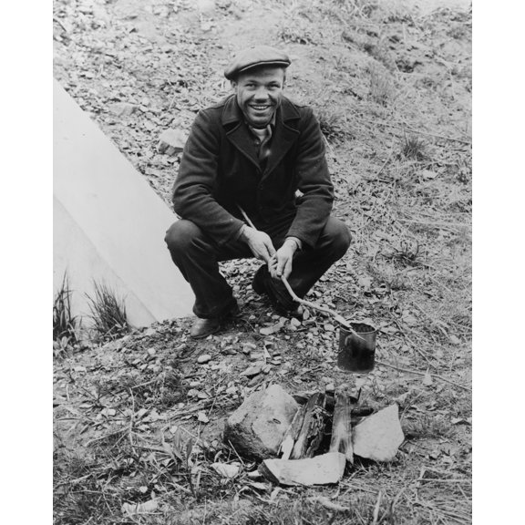 Print: Lou Ambers Cooking Over A Campfire, Using A Tin Can On A Stick)