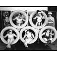 thumbnail image 1 of Print: Mack Sennett Girls In Costumes Posed With Tires, circa 1920-1932, 1 of 4