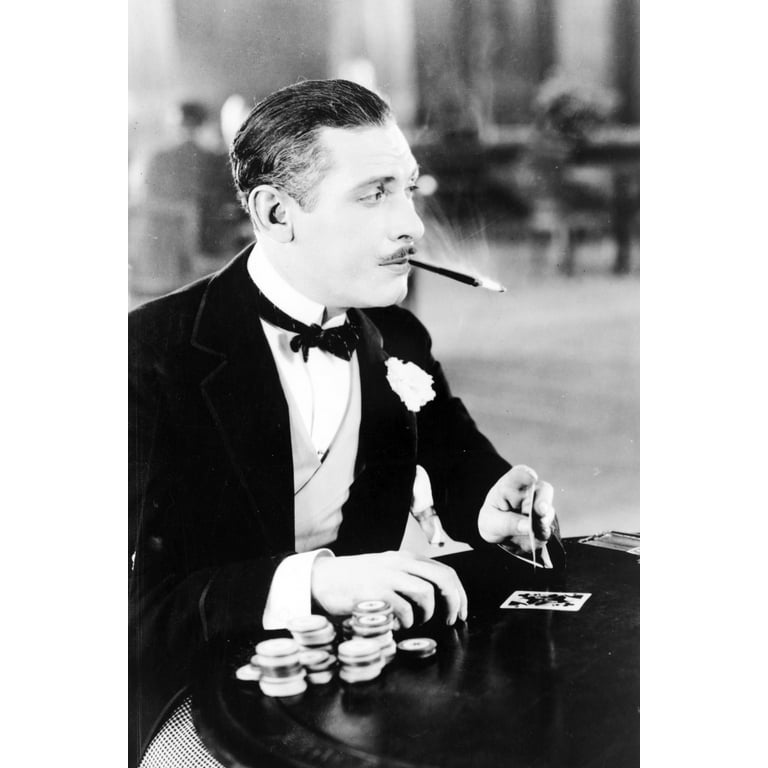 Print: Man, With Cigarette Holder In Mouth, Playing Cards, 1930