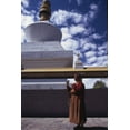 thumbnail image 1 of Print: Religious Reliquary Stupa, Woman Turns Prayer Wheel In Front Of The, 1 of 4