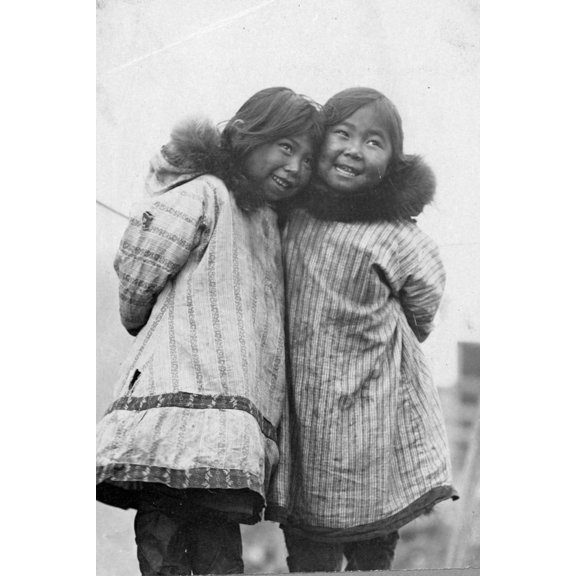 Print: Two Eskimo Girls Standing Side By Side, circa 1900