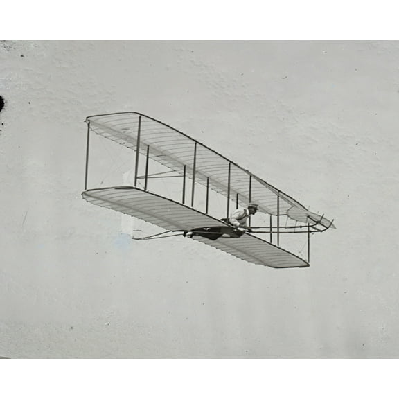 Print: Wilbur Gliding Down Steep Slope Of Big Kill Devil Hill; Kitty Hawk