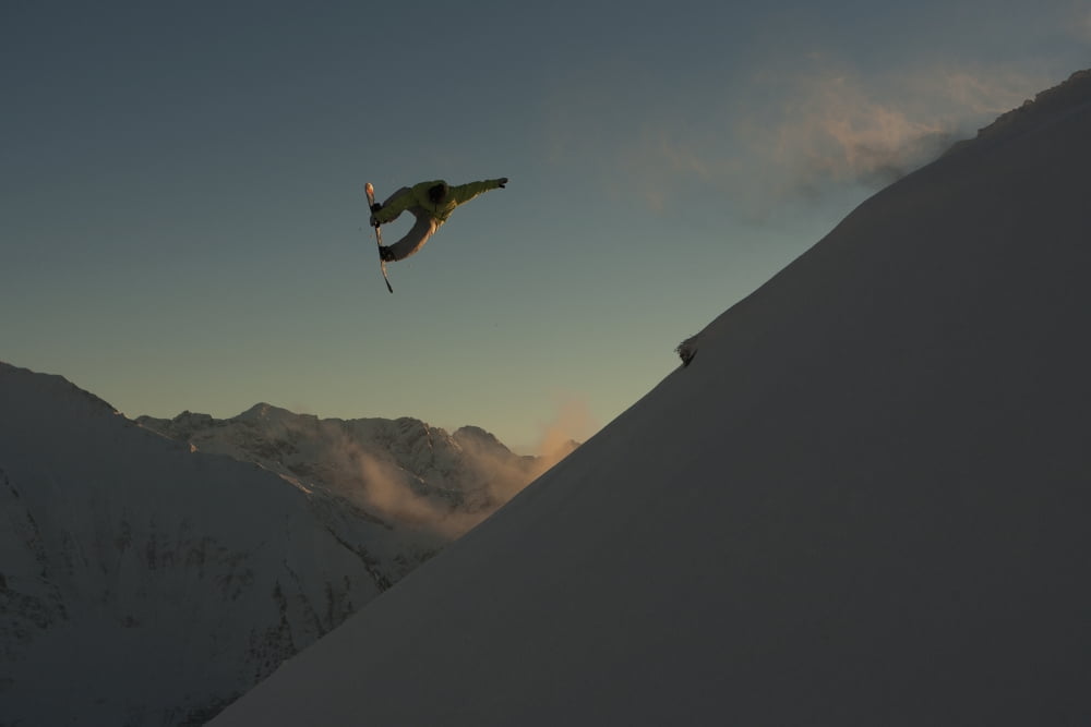 Professional snowboarder Frederik Kalbermatten extreme snowboarding at sunset Arlberg Austria Canvas Art - Dean Blotto Gray Design Pics (19 x 12)