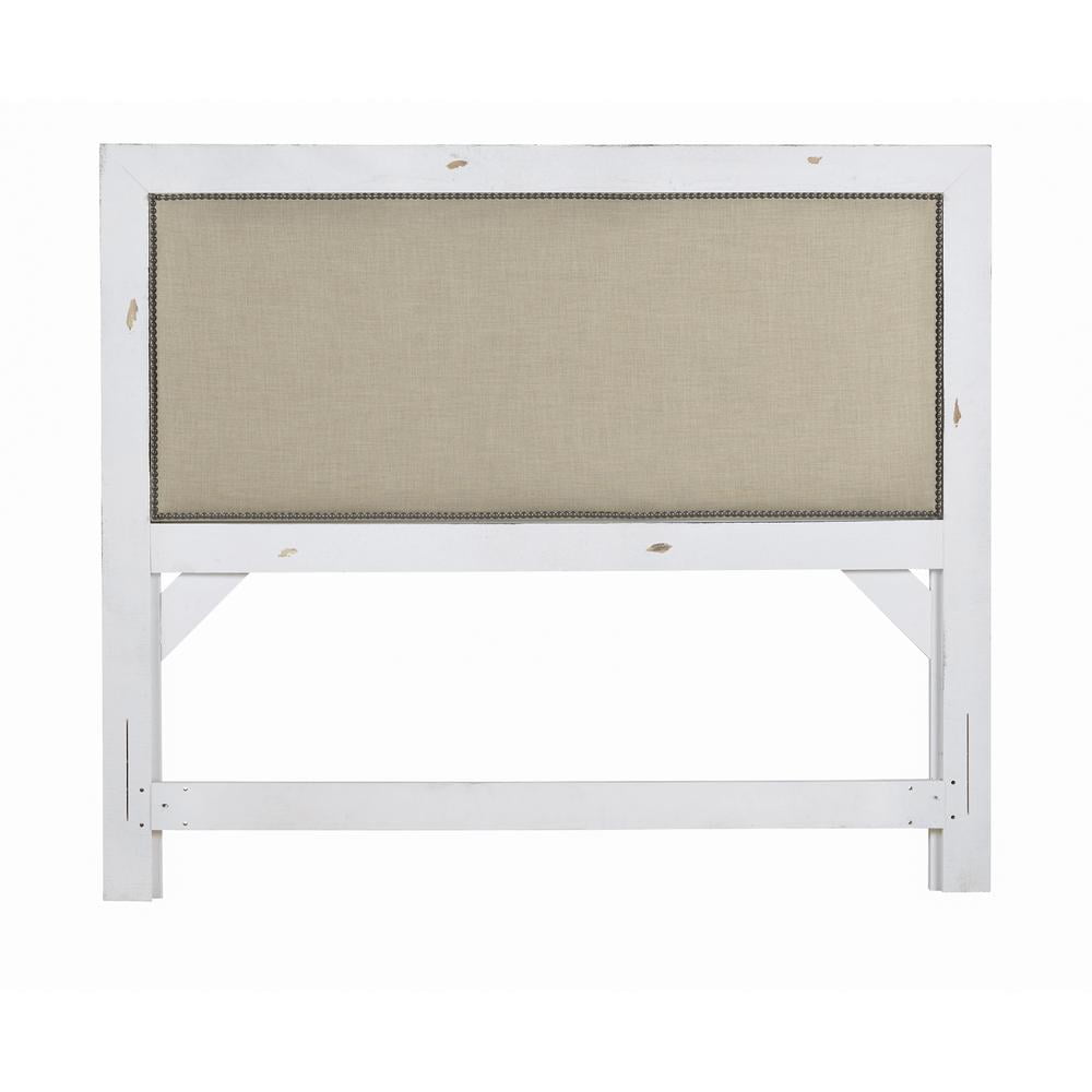 Distressed White Upholstered King Headboard with Nailhead Trim